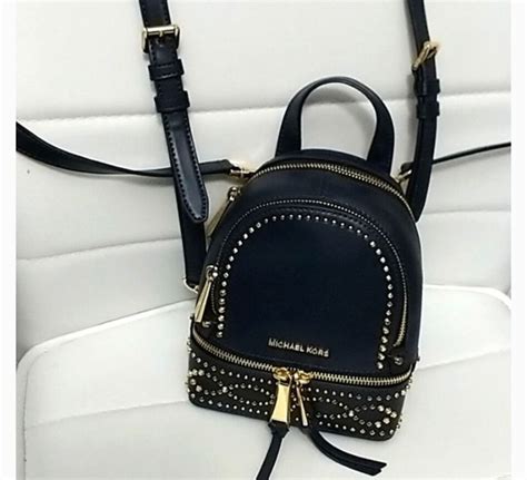 rhea mini studded leather backpack